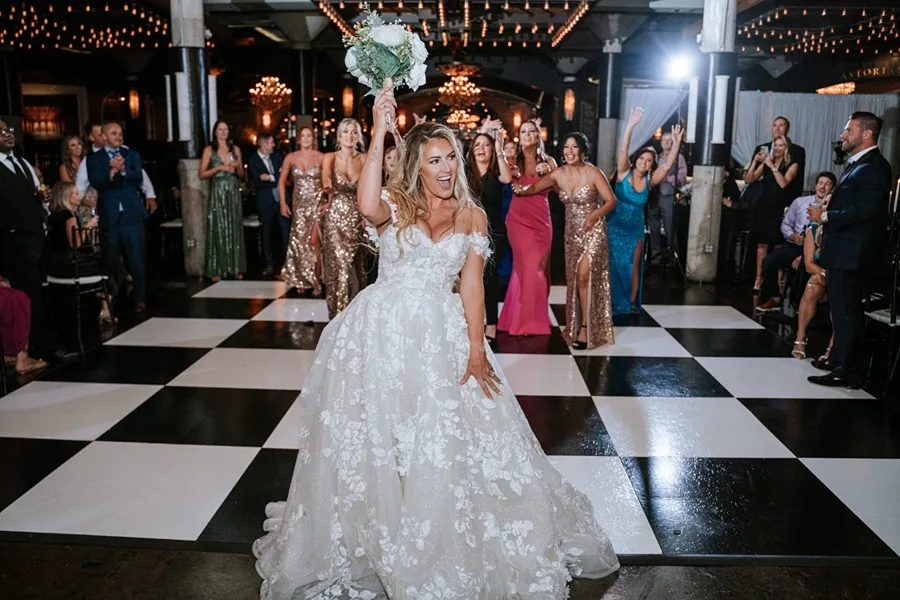 Bouquet toss on the dance floor