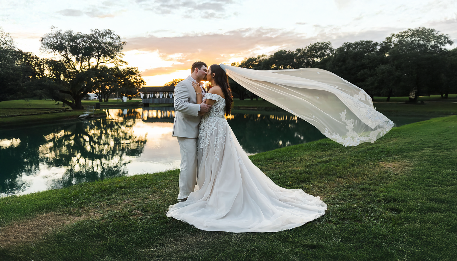 Rochester NY wedding photographer - bride and groom at sunset by a lake