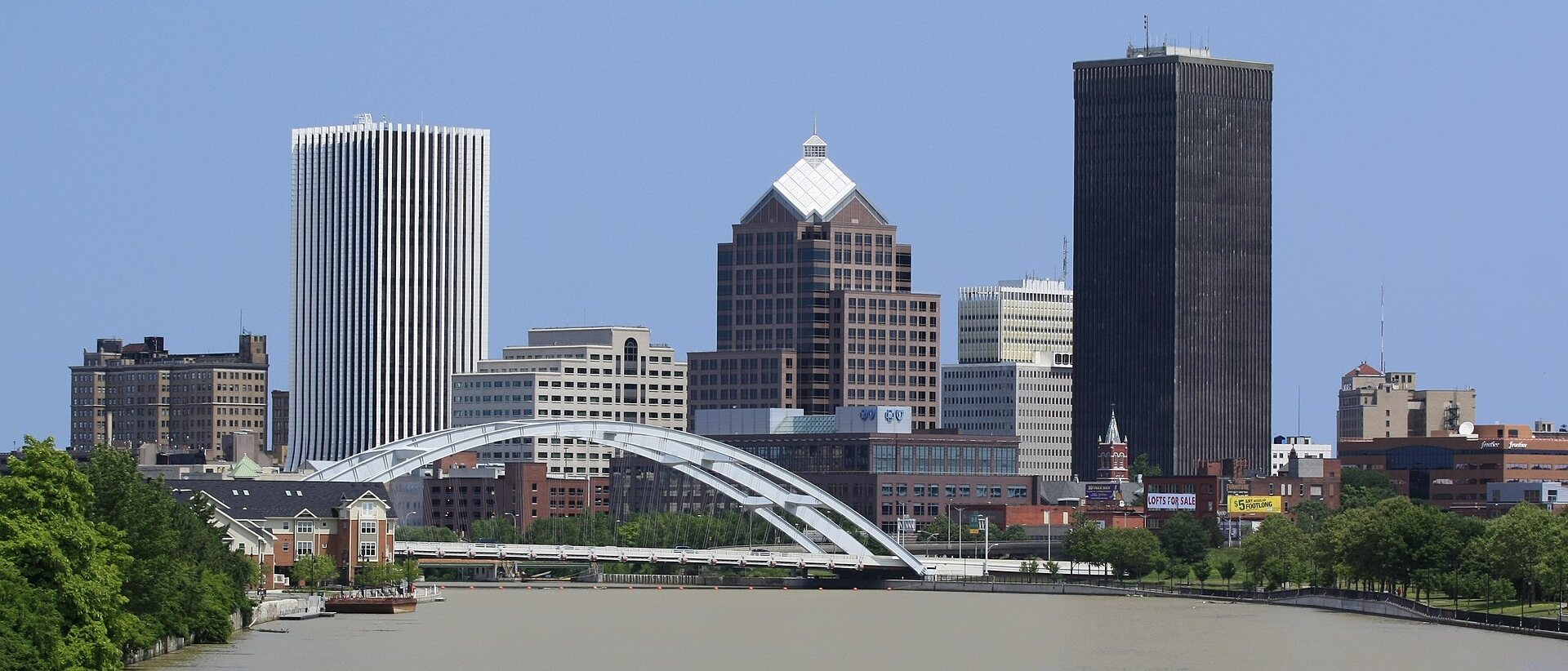 Rochester, NY skyline with the Frederick Douglass-Susan B. Anthony Memorial Bridge over the Genesee River