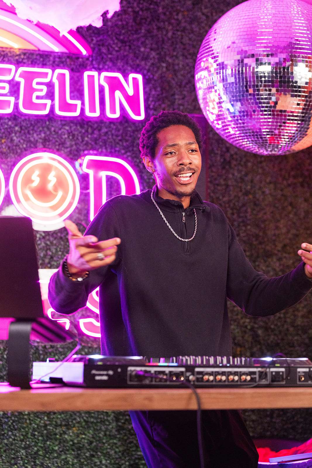 DJ Chrispy performing